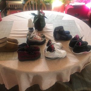 Six pairs of shoes size 12 kids